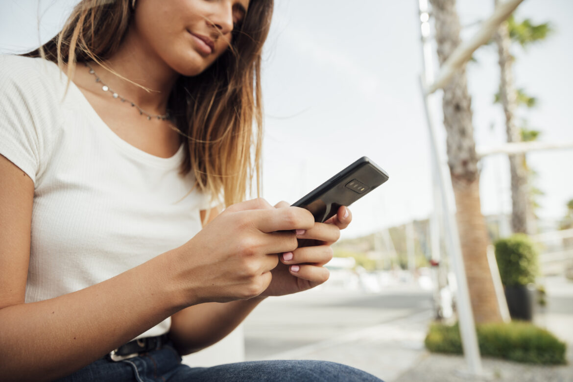 young-girl-with-smartphone-texting
