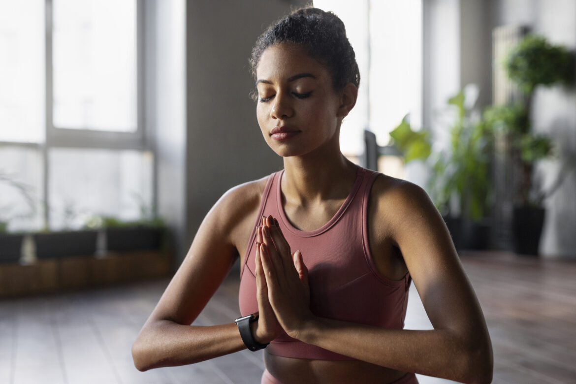 woman-meditating-indoors-medium-shot
